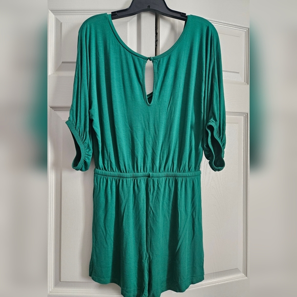 Green Short Romper Size Medium with open peep hole on back - Picture 2 of 2